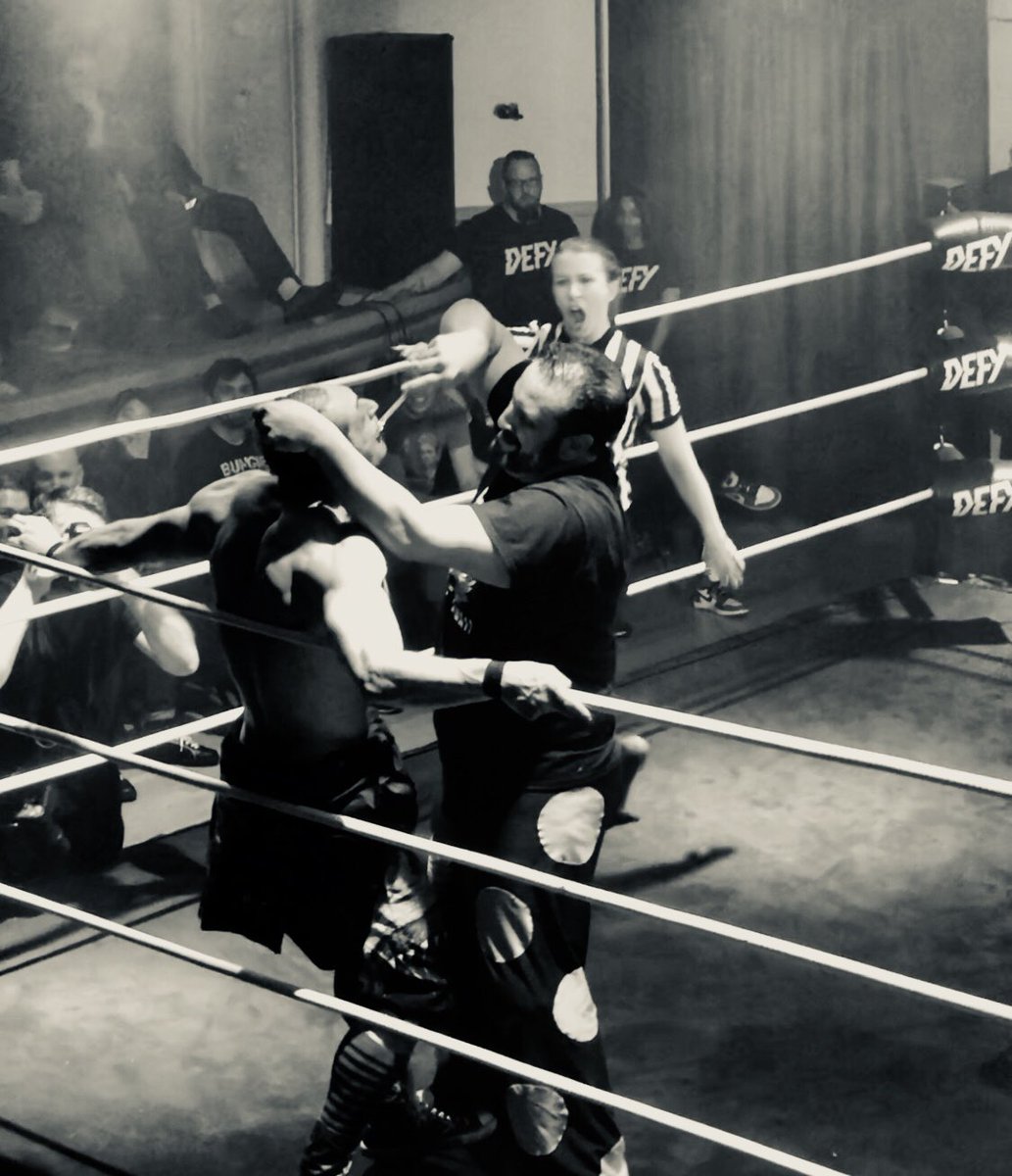 djrazs's tweet photo. That moment in the match when @THETOMMYDREAMER & @Ravenousrandy tried prying each other’s teeth out with a wrench. @defyNW #DefyVibes https://t.co/v22AV5DBzN
