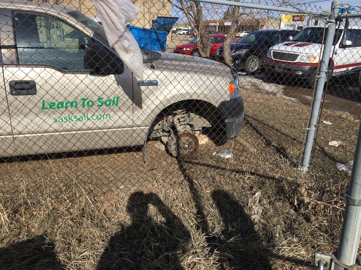 GolfSK's tweet photo. Once again our building was hit by an “outstanding citizen” who did leave his jack behind. 

On Friday, 12:00 am, a male driving a white/grey Chev pickup stole the rims/tires off the CANSail truck. 

@SaskatoonPolice @ctvsaskatoon @GlobalSaskatoon https://t.co/m21jayVhZR