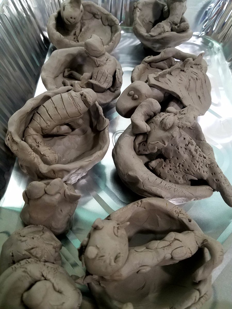 14 Ceramics 2 students spent the day assisting and teaching 2nd graders the art of pinch pot construction...we now have 195 2nd grade masterpieces to fire in the kiln.