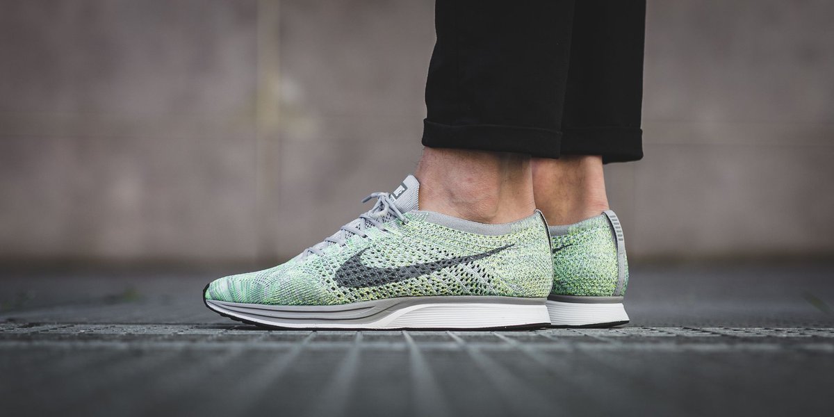 nike flyknit racer ghost green