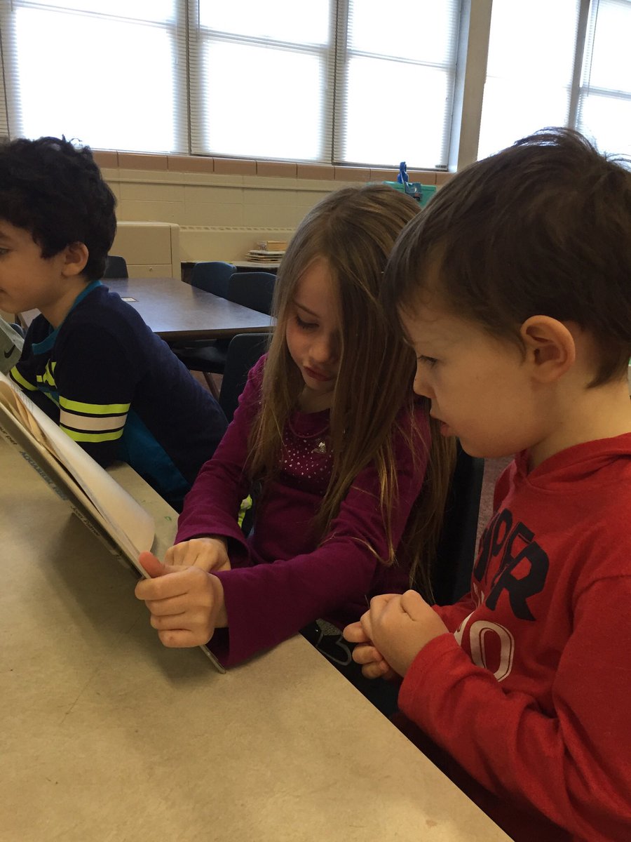 jpettykc's tweet image. Students using informational text to help make a list of items we needed for our aquarium.