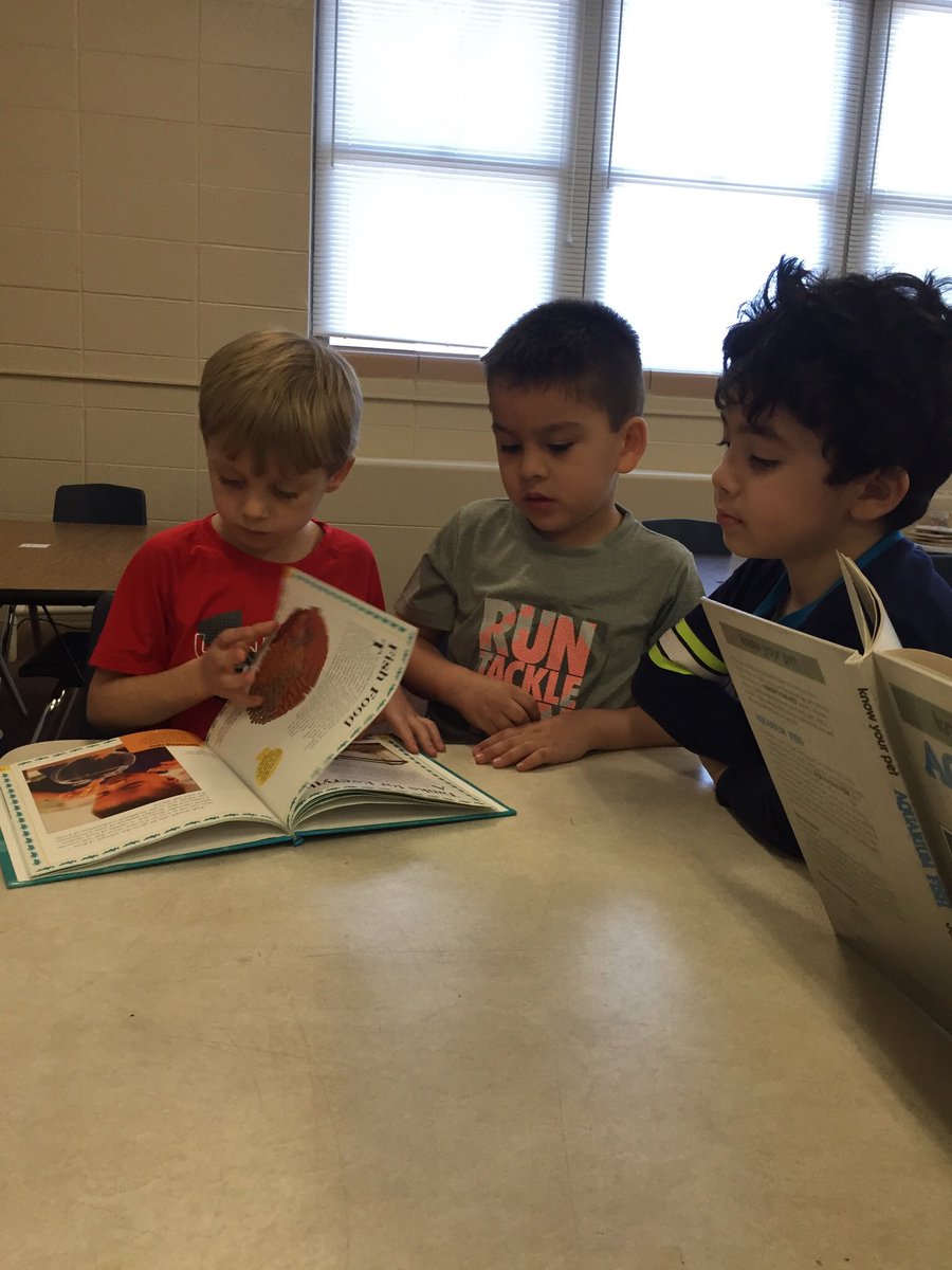 jpettykc's tweet image. Students using informational text to help make a list of items we needed for our aquarium.