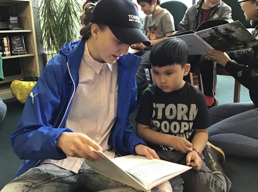 TMHS_Library's tweet photo. Creative writing student authors read their books to Riverbend Elementary kindergartners at the @TMHS_Library! https://t.co/tTlEJQhx0w