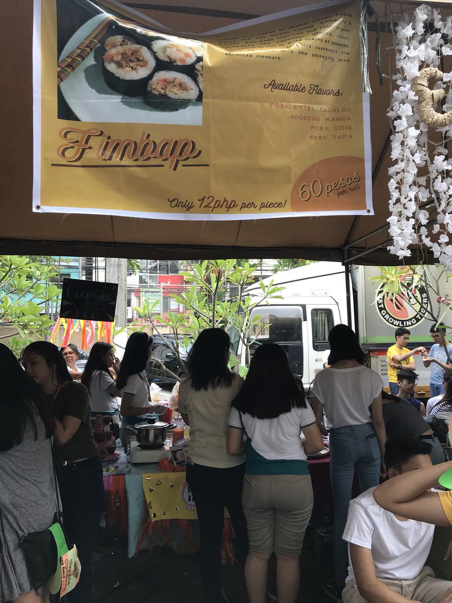 FlMBAP's tweet photo. Our booth is now open!! Come thru! 🧡 We’re here at the UST TYK Parking Lot until 5pm! 😉 #F1MBAP https://t.co/LhnhwlC6YY