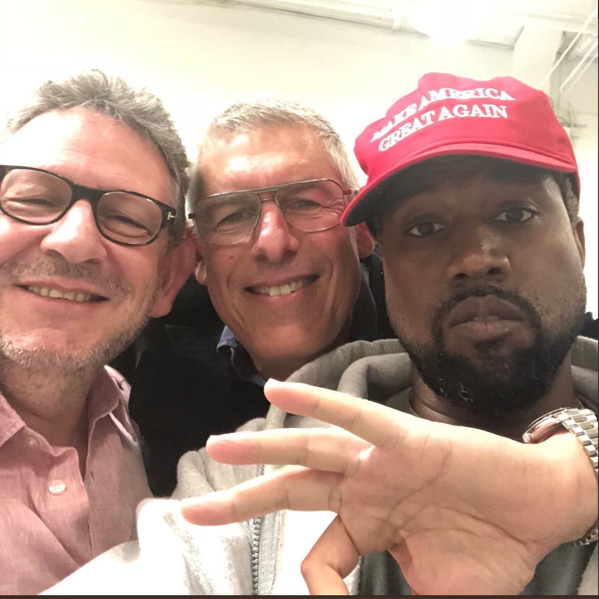 Quadrant4change's tweet photo. This is what happens when you watched GET OUT, but STAYED anyway. Dude is straight up flashing a White Power sign and Kayne is in like Flynn!
#KanyeWest #puppet https://t.co/MlBKqZYEJ4