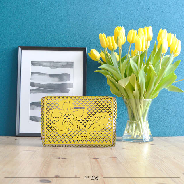 bulaggi's tweet photo. Yellow stands for sun and happiness, add some yellow to your live with is beautiful bright clutch! #bulaggi #yellow #happiness #clutch #tzabar #bulaggithebag #lovemybag https://t.co/7u9OVkMjgz