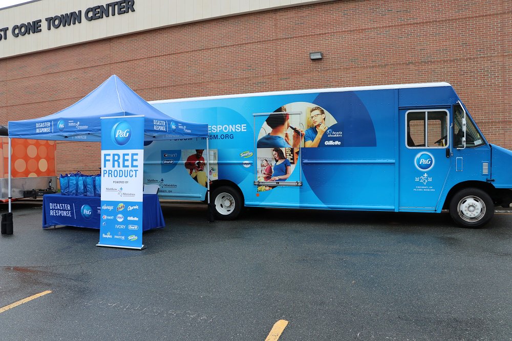 Tampax's tweet photo. As part of @ProcterGamble efforts with @M25M Disaster Response Team in Greensboro, NC, Tampax is proud to provide tampons to the families impacted #PowerOverPeriods 💙 Learn more: https://t.co/YgicfKcUG6 https://t.co/mNsvR1XqPq