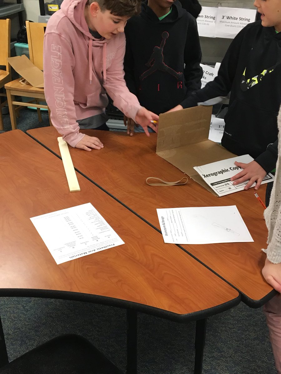 WISRocks's tweet photo. Mr. Davis and students are brainstorming robotic arm designs! Canโt wait to see the final products! #RocksAchieve https://t.co/q7hsnXMcrx
