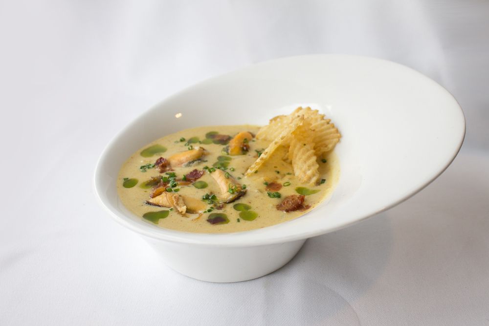 This Curried Mussel &amp; Potato Chowder is the perfect addition to your winter menu.  Chef Scott Morash Garnished his chowder with Chive Oil to add a pop of taste and color. #syscomaritimes