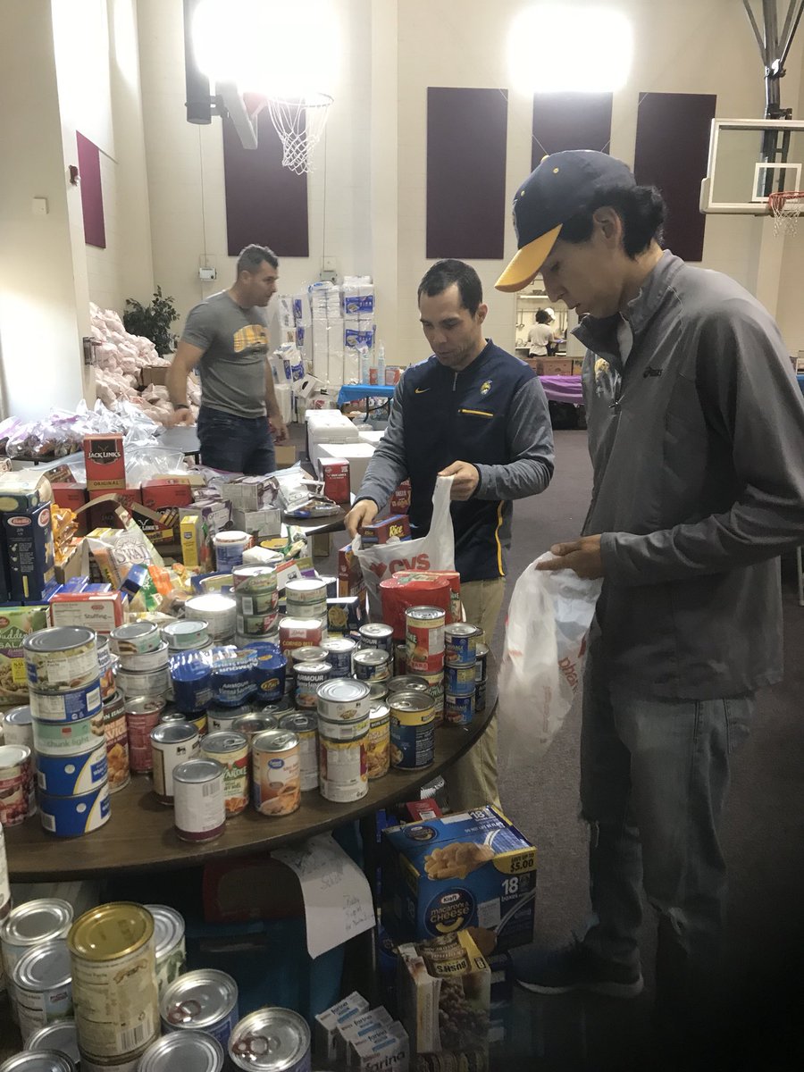 uncgspartans's tweet photo. It’s our 5th Annual UNCG Big Help Day!
Our coaches and staff are volunteering at @greensborocity Storm Recovery preparing bags of food and supplies for storm victims. #UNCGBigHelp #letsgoG https://t.co/Ux6rl73YHi