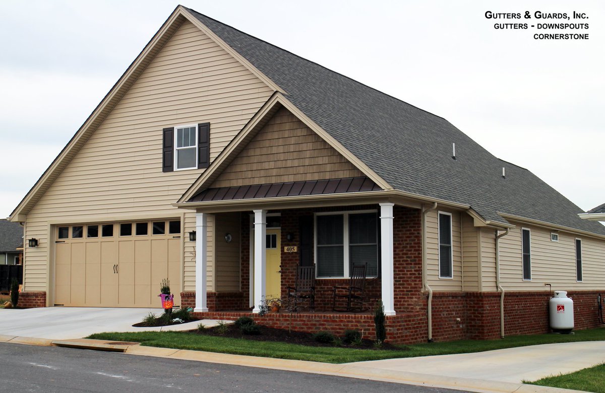 We installed the gutters and downspouts on this home in Cornerstone in Lynchburg. They look great with the cream colored siding! #ThrowbackThursday