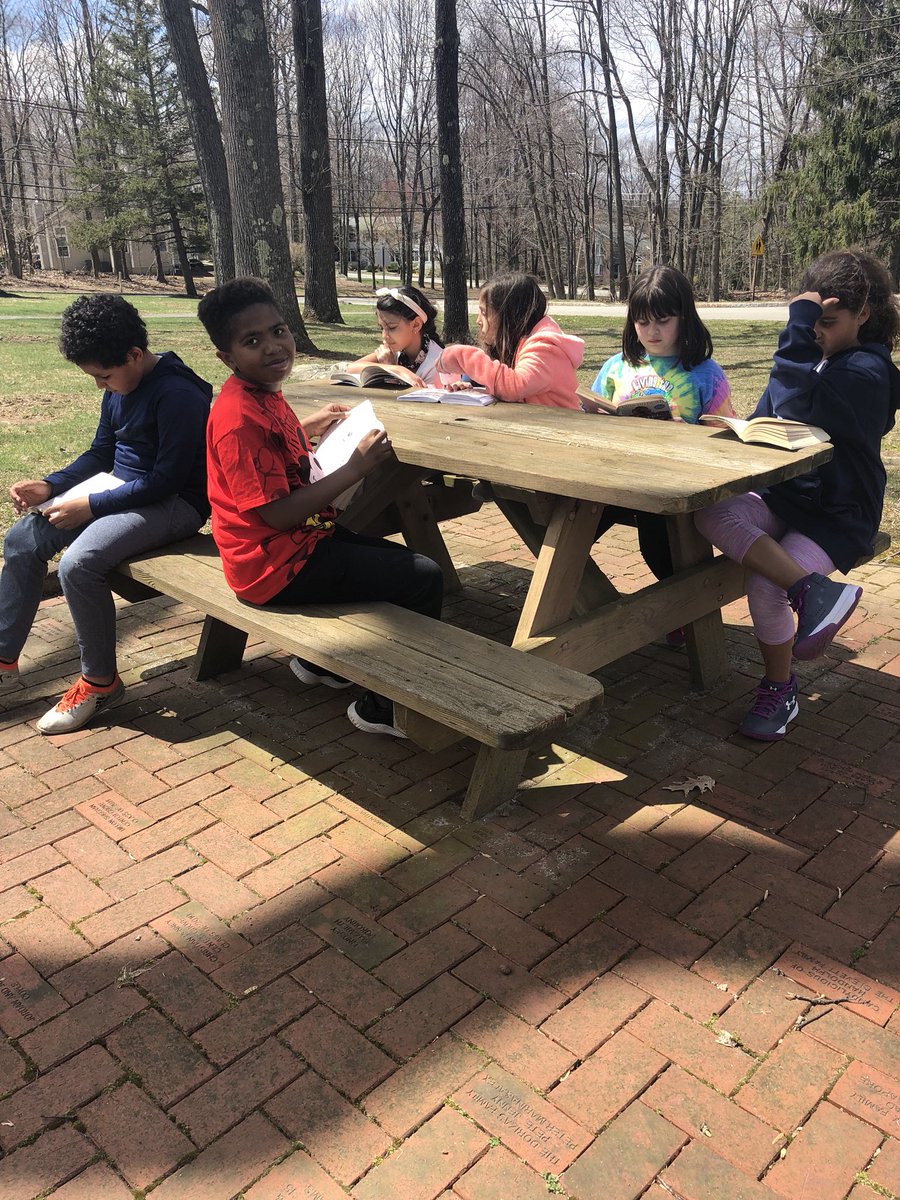 CG_grade4's tweet photo. Enjoying afternoon reading time in the front courtyard! @CenterGroveES #carusorodimer102 #happyspring https://t.co/9HkfAfOxQJ