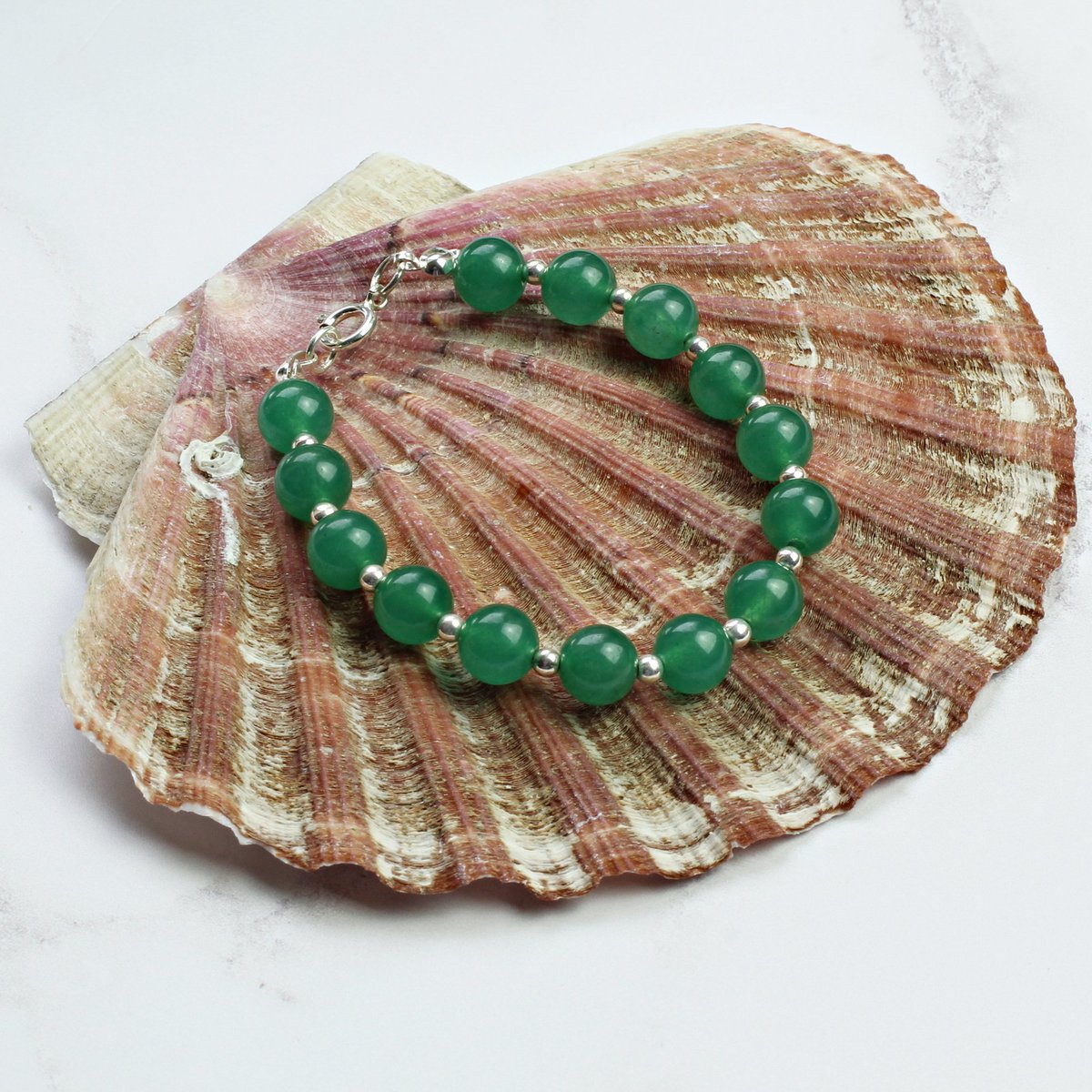 seawitchscavern's tweet photo. Green Jade Bracelet with Sterling Silver. Protective Bracelet by #SeaWitchsCavern  https://t.co/OKD8jhrL7F  #OnlineCraft #womaninbiz #bizclubUK
#shopsmall https://t.co/Qxn9Jg2xFU