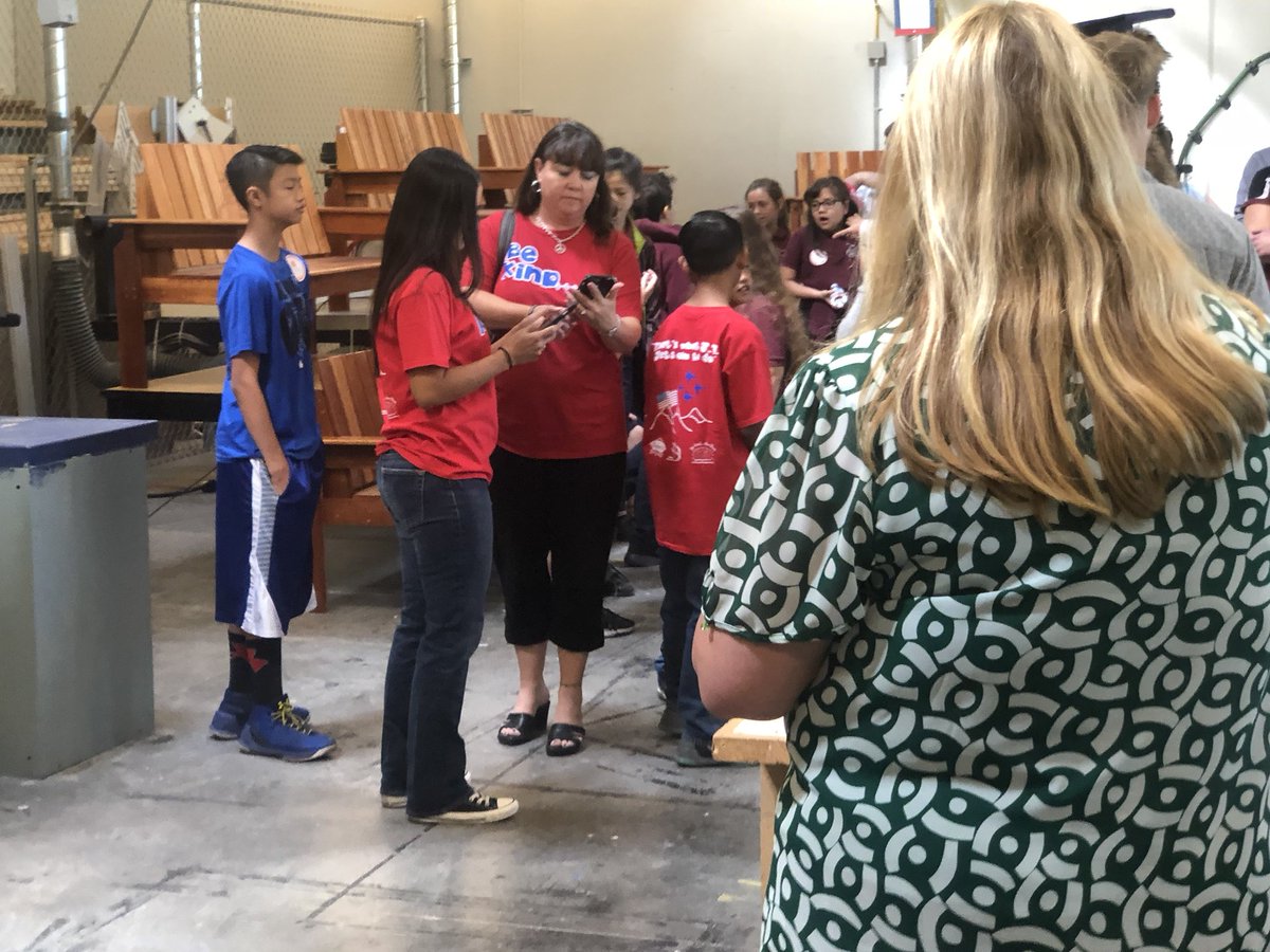 NwctaHawks's tweet photo. The #BuddyBench dedication ceremony. 10 more benches getting ready to go out to 10 more @ClarkCountySch elementary schools. Thanks to @wgu and #NevadaContractorsBoard for making this happen. @CTEinCCSD @romzek54 @CCSDMagnet @NevadaACTE @whtnychrs @NWCTAbusiness https://t.co/Fxcg4vSmtW