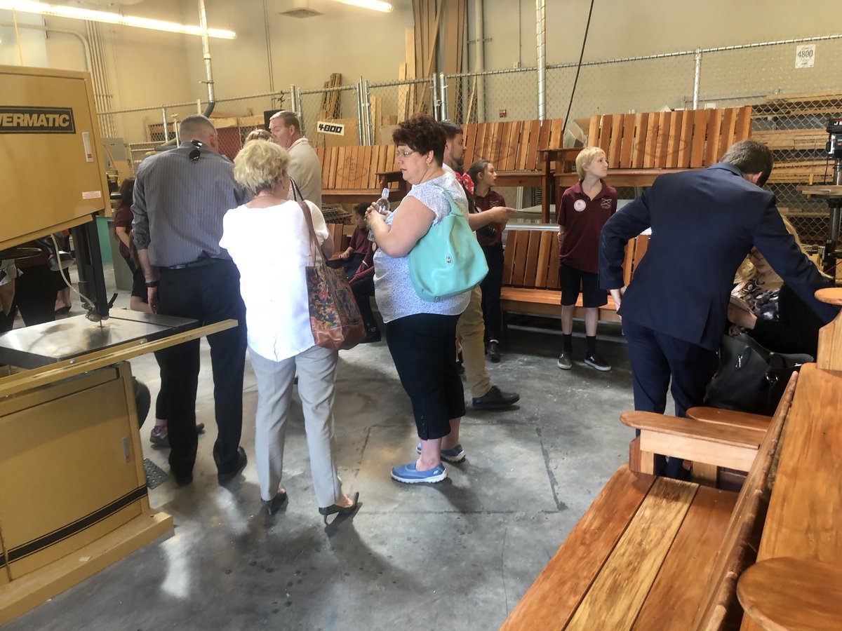 NwctaHawks's tweet photo. The #BuddyBench dedication ceremony. 10 more benches getting ready to go out to 10 more @ClarkCountySch elementary schools. Thanks to @wgu and #NevadaContractorsBoard for making this happen. @CTEinCCSD @romzek54 @CCSDMagnet @NevadaACTE @whtnychrs @NWCTAbusiness https://t.co/Fxcg4vSmtW