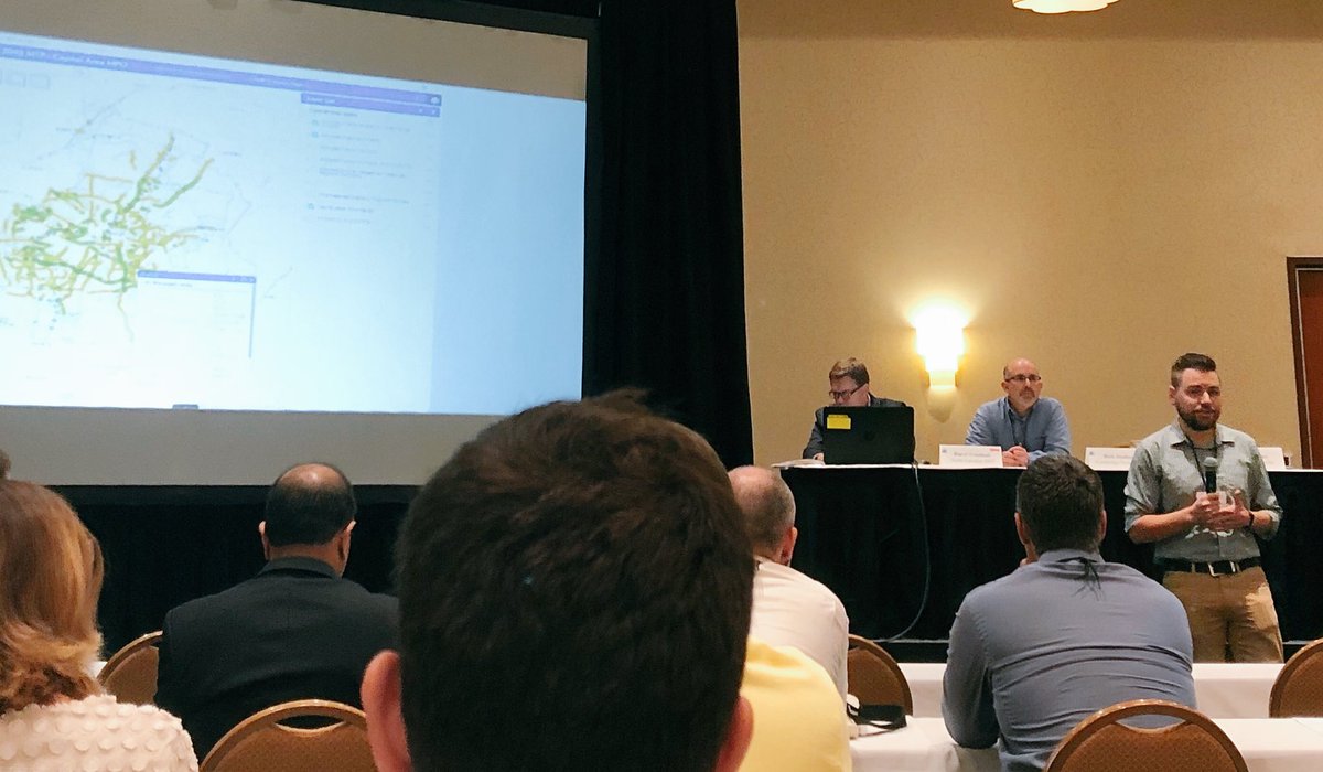 CapitalAreaMPO's tweet photo. Our team is back in the spotlight! Showing how we can improve connections between Wake-Durham &amp; how we organize data to help leaders make the best decisions about transportation in our region. Way to shine Paul and Tim! #NCAMPO #NCAMPO2018 #NC98 https://t.co/v1zugv0Uey