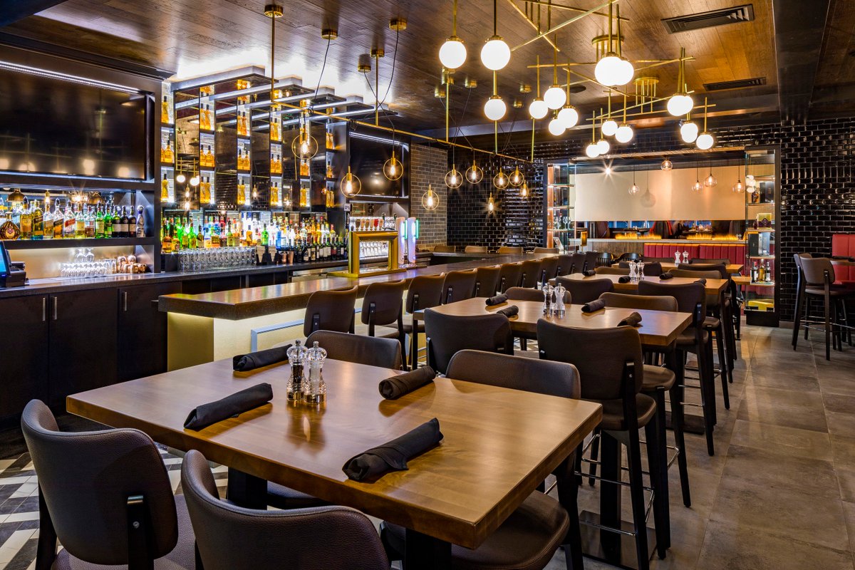 #WareMalcomb #Toronto completed renovations for @BatonRougeSteak #restaurant in Vaughan, Ontario! The renovation featured a reconfiguration of the dining and bar areas, custom millwork, and an exterior refresh. #WMToronto #InteriorDesign
