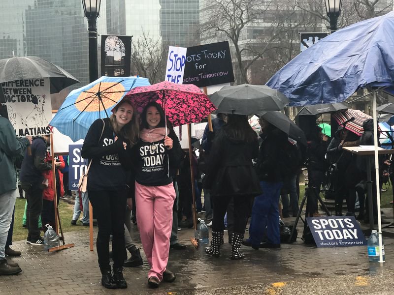 uoftmedicine's tweet photo. Dozens of med students from @UofT & across the province gathered at Queen’s Park yesterday to press political leaders for a long-term solution to the lack of residency spots for graduating medical students. https://t.co/ooKQXY6k3i https://t.co/Cc94whnLts
