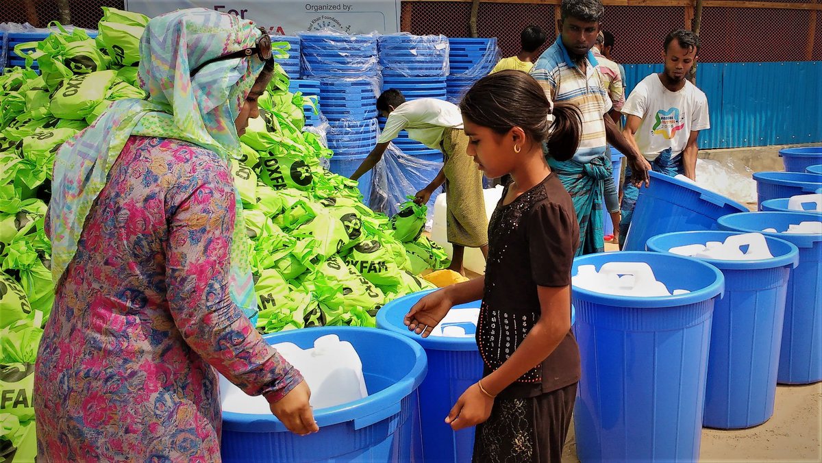Oxfam's tweet image. We're helping #Rohingya families prepare for monsoon rains &amp;amp; prevent spread of water-borne disease by distributing hygiene kits (soaps etc.) &amp;amp; water canisters + training #refugees in hygiene &amp;amp; health: oxf.am/2F8weBS