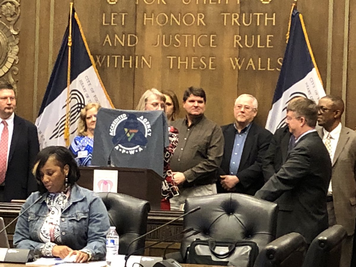 APWAStephen's tweet image. KCMO PW Director Sherri McIntyre shows off new “Accredited” public works t-shirts