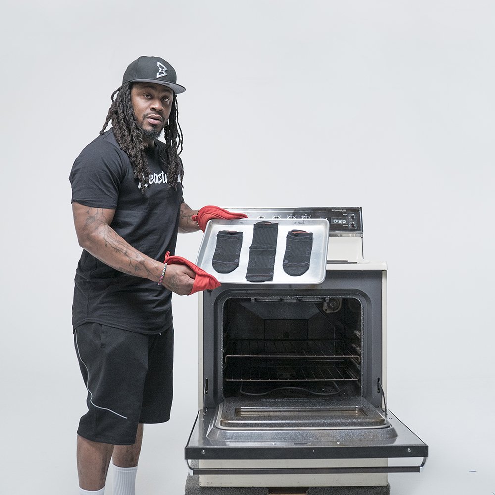 Strideline's tweet photo. "Strideline socks make your feet feel warm when you're cold and cool when you're hot. Fresh out the oven." _ Marshawn Lynch @Beastmode #strideline #socks #sockgame #beastmode #beast #mcsoe https://t.co/8YQSFNv9AI