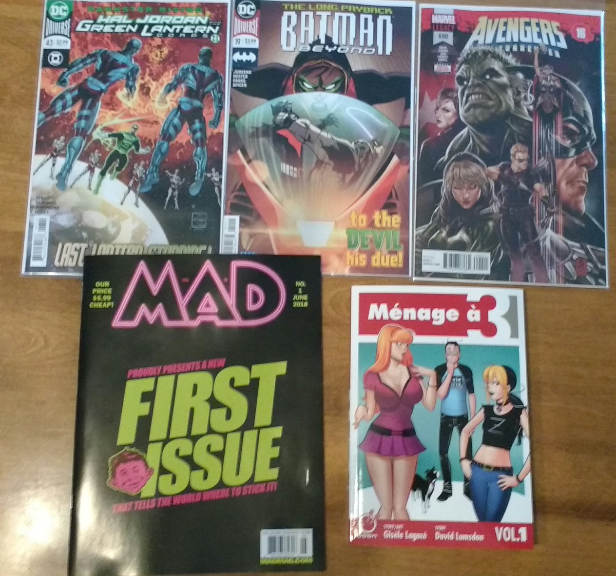sinshadow32's tweet photo. My #NCBD grab including .@PixieTrixComix #MenageA3 and a .@MADmagazine ! https://t.co/lITrDl0bZQ