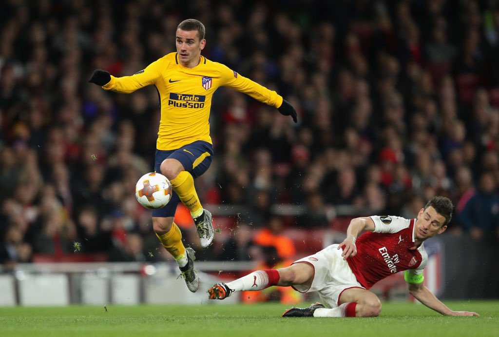 usasoccerguy's tweet photo. The Greaseman slides away from London Arsenal deefence guy Laurent Koszczesny to go score the roadtrip goalshot for the Madrid Athletes. The Cannons dominized the game, but could not insert more than La Cassette's head kick against the numerically challenged EPL Spain franchise. https://t.co/S3JnlQDryd