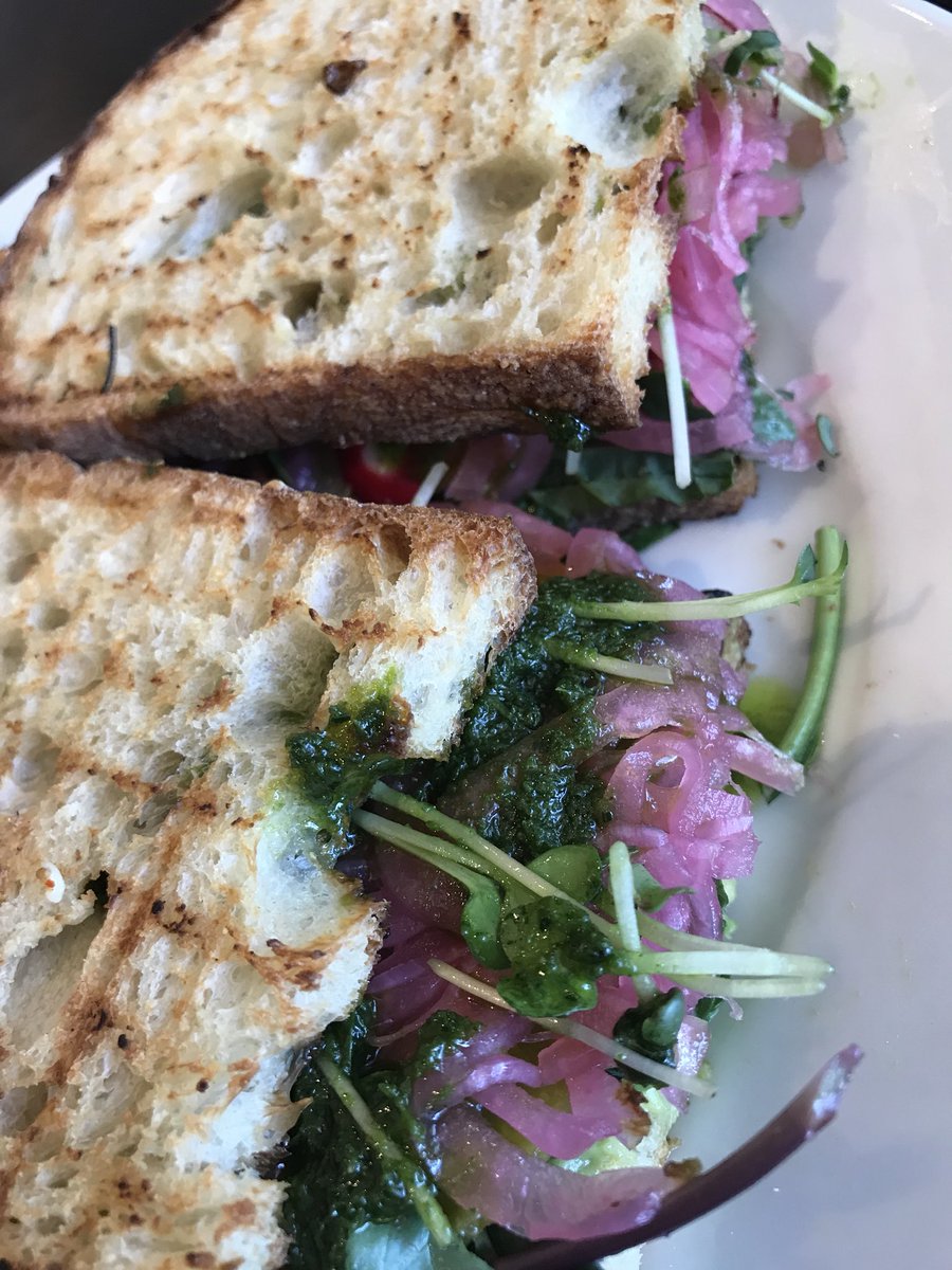 StacyeBranche's tweet photo. #lunch today the amazing #VeggieSandwich at @blujamcafe #rainbowkale #smashedavocado #redradishes #freshbeets #pickledredonions #daikonsprouts #vegantarragonaioli #rusticItalianbread #vegetarian #vegetarianfood #eatyourveggies #adventuresofstacye #adayinthelife https://t.co/0Rdl4L6W8H