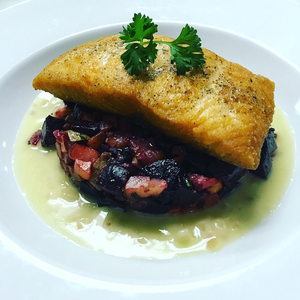 Tonight’s special: Pan-seared Faroe Island Salmon over beets, celery, and purple carrots in a lemon-red chili flake buerre blanc.