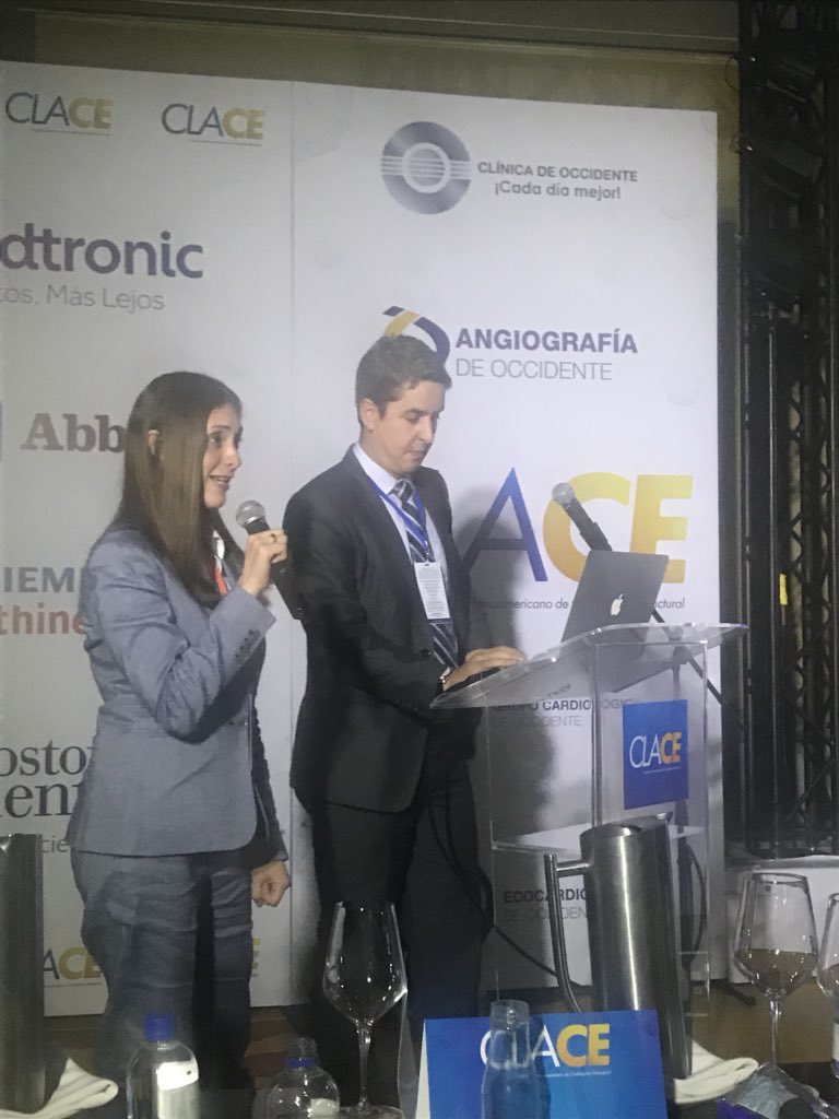CarlosAlfonsoMD's tweet photo. Passing of the torch as @GBaqueroMD introduces current @UMiamiHealth structural IC fellow @FAlbuquerqueMD for discussion of self expanding vs ballon expandable #TAVR during @congreso_clace @angiografiadeo @TheIMIatUM @DrMauricioCohen @UMJMHCardiology https://t.co/77nQWYxFT4