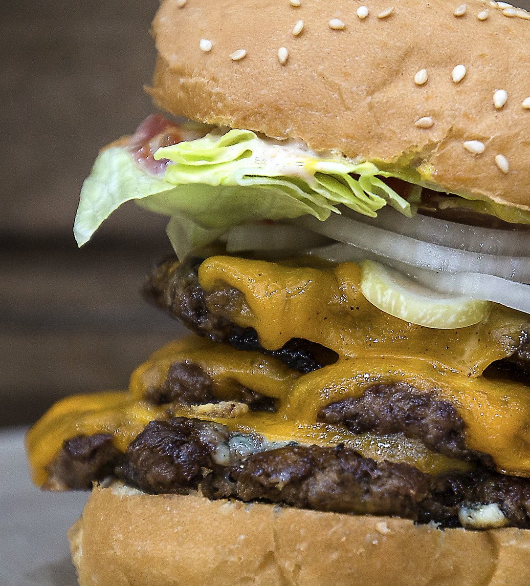 It's #TripleThreat Thursdays! Indulge in 3 delicious patties, 3 slices of cheddar cheese and premium toppings, finished off with our signature Hangry Sauce!