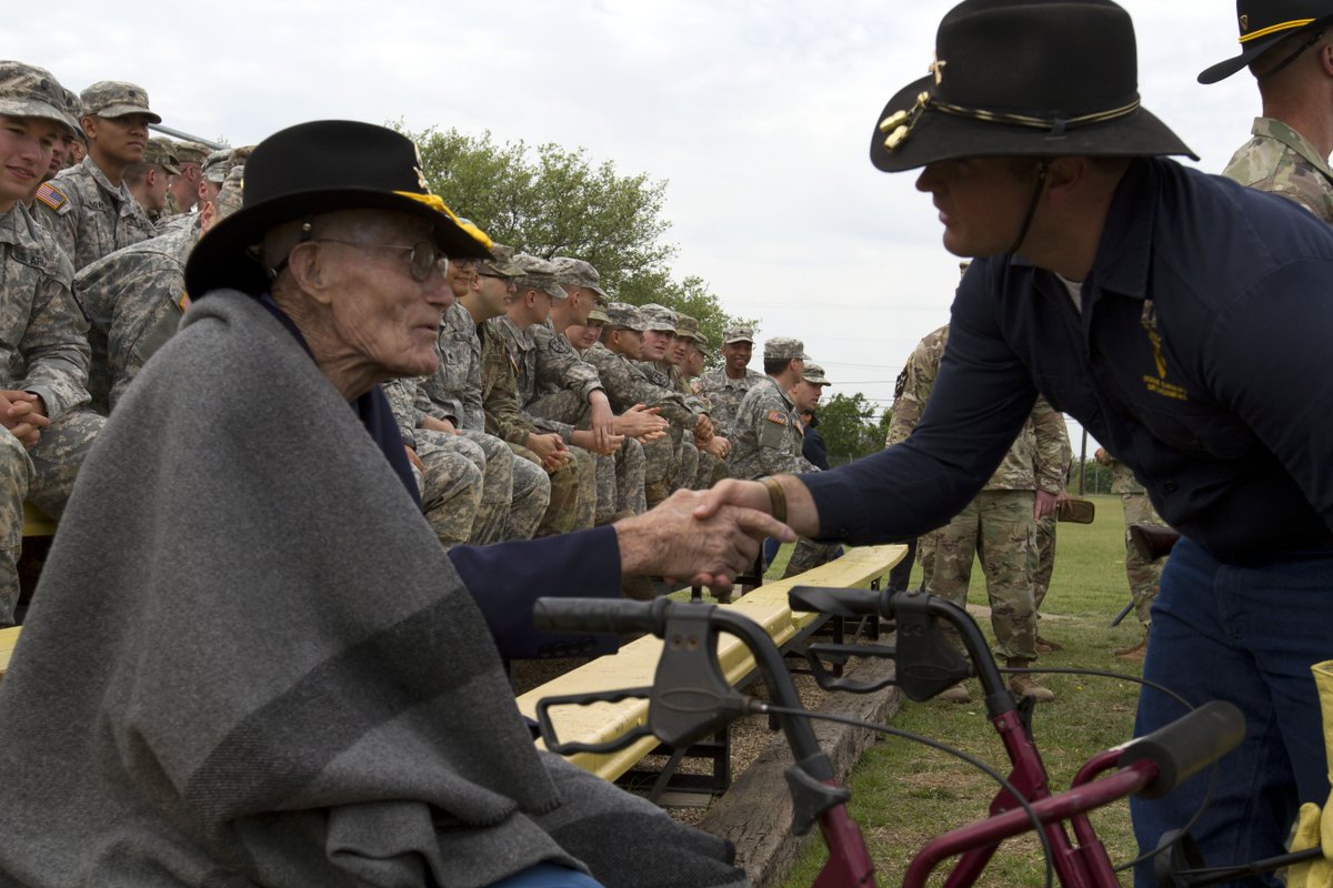 1stCavalryDiv's tweet photo. SSG(R) Yarbrough, who is 100 years old and served with the 5th Cavalry Regiment in WWII, is greeted by the1CD Horse Calvary Detachment commander during a demonstration there that Yarbrough attended. Yarbrough is one of the last few living troopers who rode a horse into combat! https://t.co/6k28JMhbVs