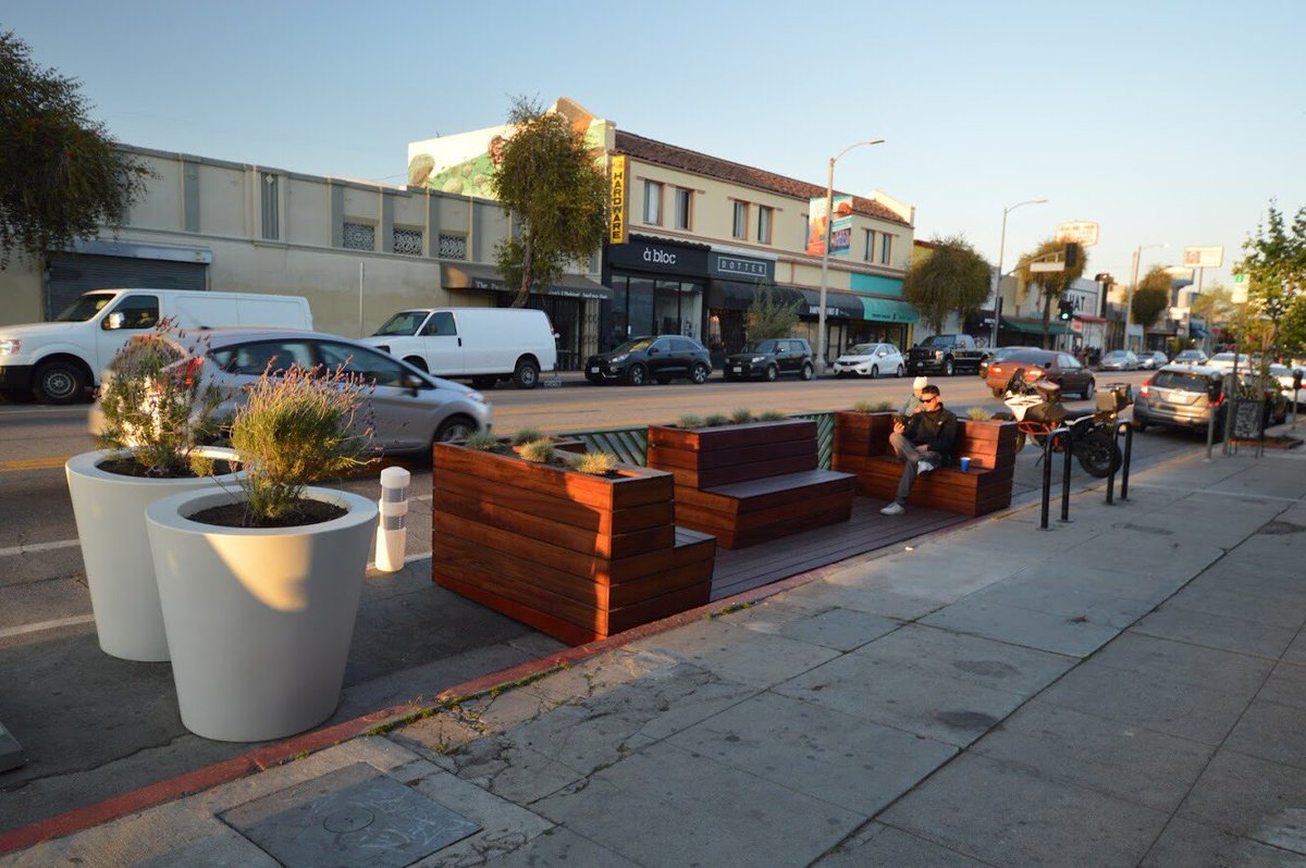 daveedkapoor's tweet photo. father and daughter enjoying the sunset on the #LAsidewalks in the new community built @LADOTPeopleSt parklet on York https://t.co/kUdTgktjAc