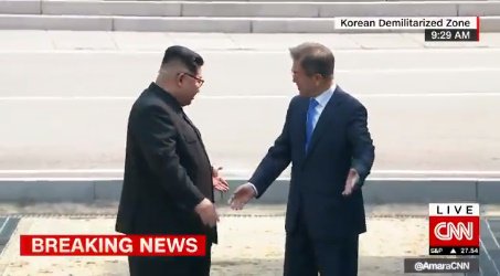 jamacabee's tweet photo. That moment when each of them offered the other to cross the military demarcation line to set foot on each other's "territory" https://t.co/V20XunxGQi