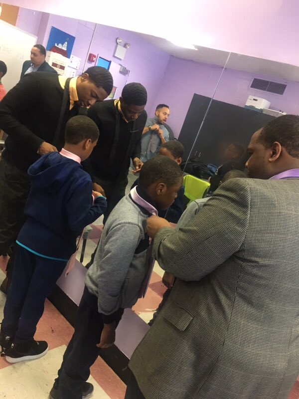 dstnyac's tweet photo. At EMBODI, our young boys learned how to tie a tie. #windsorknot #simpleknot #seeusinaction #dstnyac #FirstGradChapter #NYACinAction #NYACEmbodi #watchuswork #gamechangers #ServiceSaturday #DST1913 https://t.co/Zz4OUsoTrQ