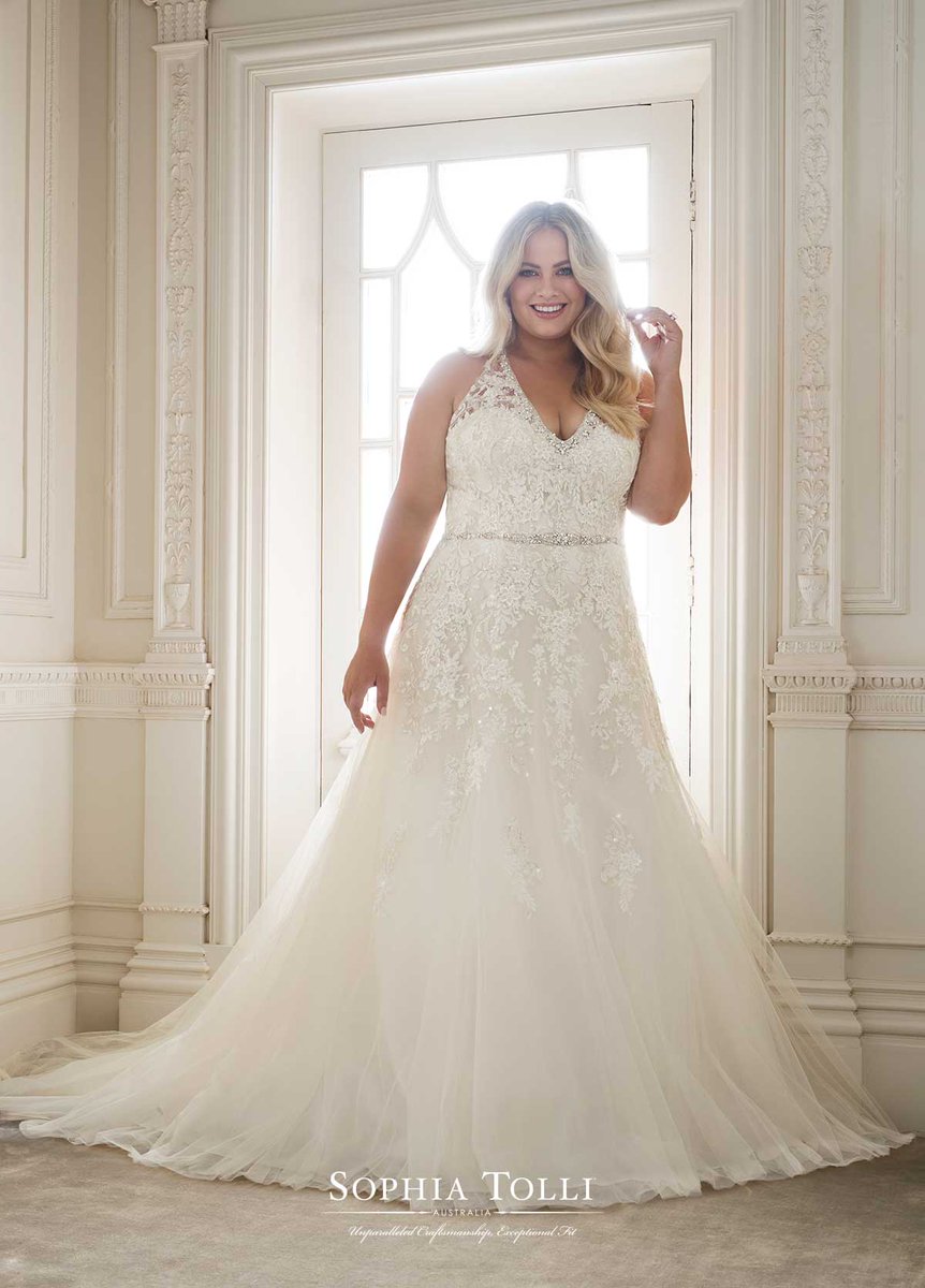FleurdeLysBride's tweet photo. This Misty tulle over satin, A-line gown with Deep-V neckline will flatter any bride-to-be. The crystal encrusted beaded neckline and belt feature accentuate your best assets and are beautiful added details to an incredibly elegant gown. #celebrateyourcurves #wedding #sophiatolli https://t.co/NKdPwcNNYe