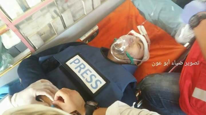 Ruthanasia's tweet photo. The #Palestinian #journalist has been injured, #HashemHamedeh, shot in the head with a tear gas bomb by Israeli occupation forces while he was covering the #GreatReturnMarch. via FB #BDS @UN @spj_tweets #WarCrimes #StopTargetingJournalists! #StopKillingProtestors! https://t.co/TZqVIzIPFU