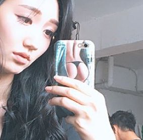 eunji with a whole girl's ass on her phone-case (2018)