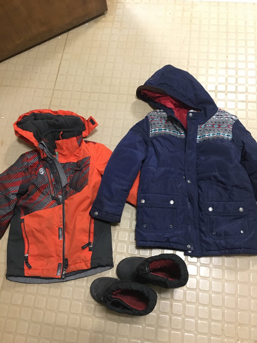 Do I look familiar? Some of the many coats, snow pants and boots in our Lost and Found!