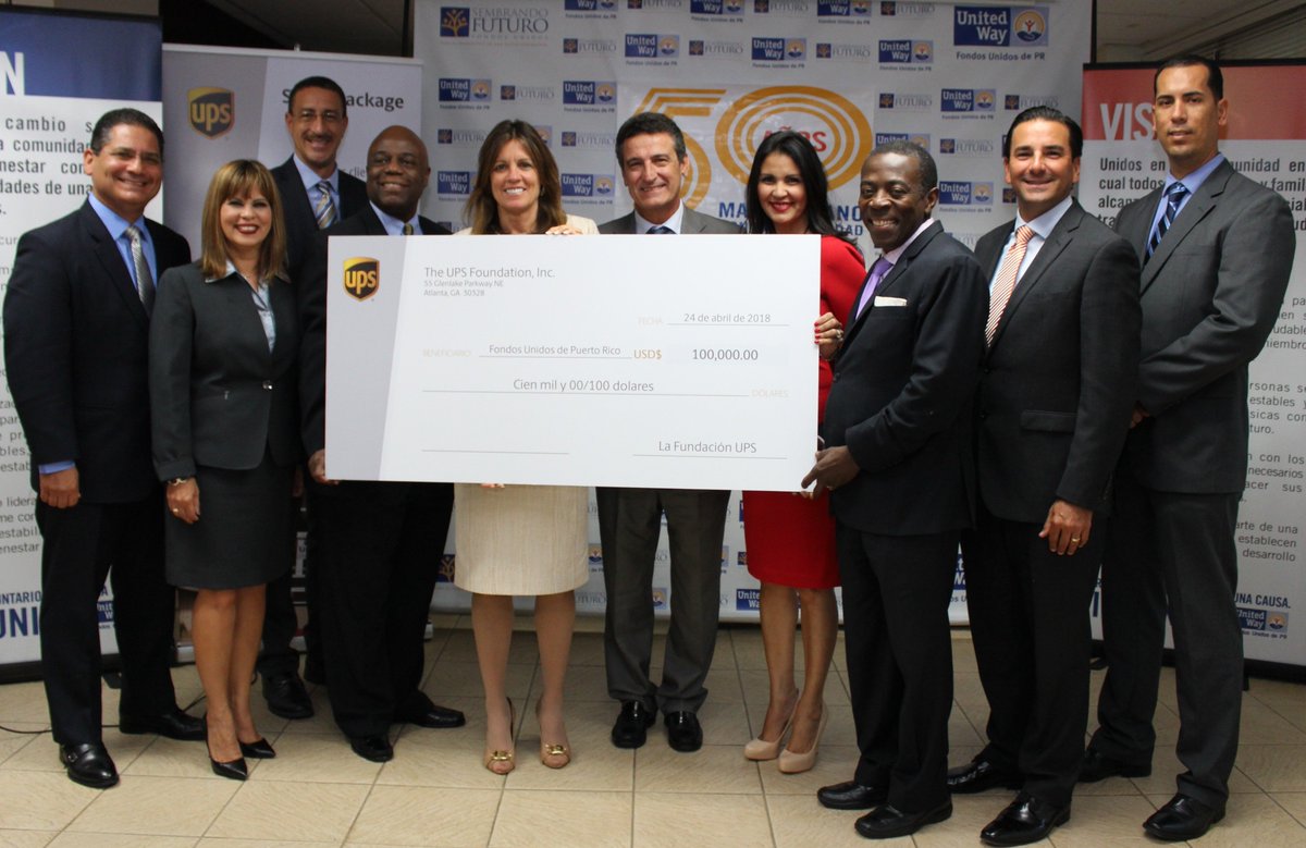 UPS's tweet photo. Our commitment to #PuertoRico continues to be a priority. This week the @UPS_Foundation presented @FondosUnidos 100K toward its fundraising campaign to benefit local communities in the wake of #HurricaneMaria. https://t.co/rV7byc0BmN