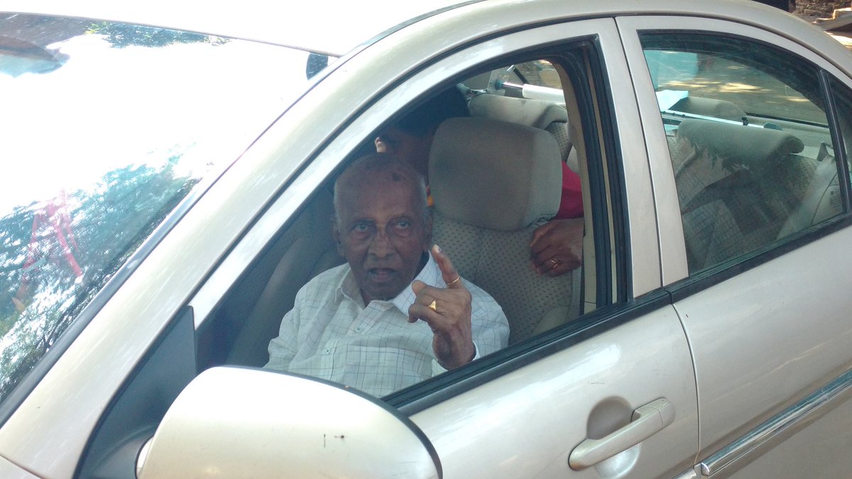 VishKVarma's tweet photo. Janakiram, 90 years old, leaving with his family after casting his vote at a booth in Shivajinagar in Bengaluru @IndianExpress #LiveInKarnataka https://t.co/XHGeVaWdcD