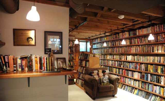 Then there's  @neilhimself's beguiling basement at his Minnesota home, filled with books, awards, a cat and, of course, gargoyle heads.