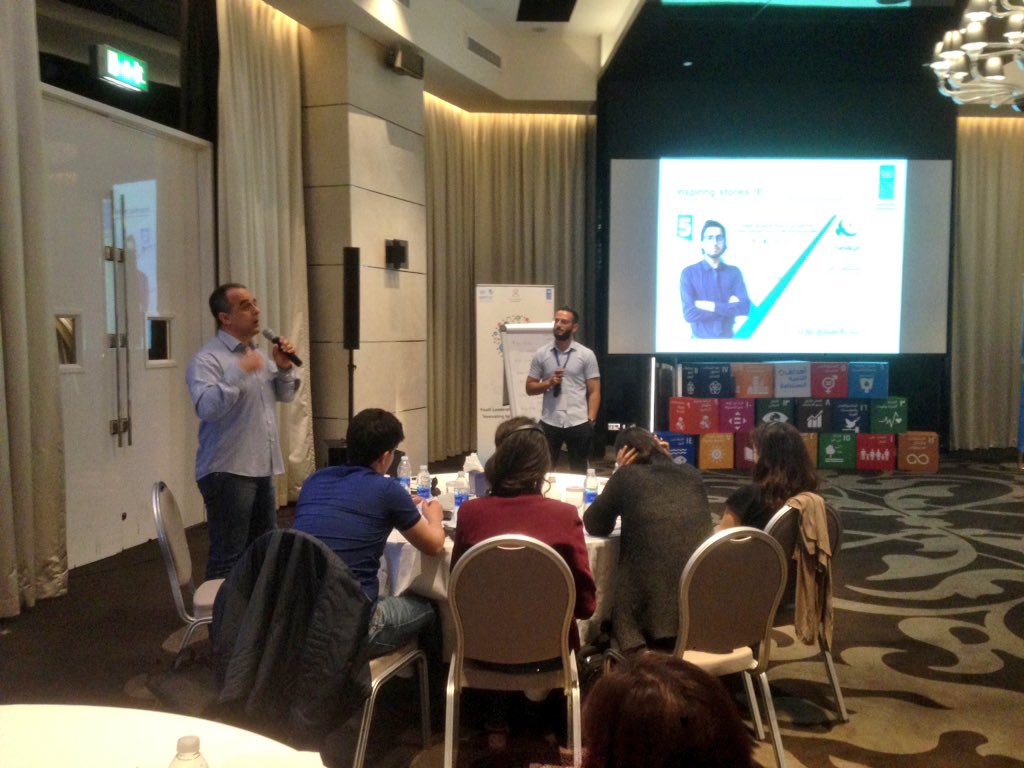 UNDP_Shababeek's tweet photo. Abdelmajid Jalled from the #Tunisia ministry of #youth and sports, shares his experiences in Osama Aljabers session on political participation. We can only achieve the #SDGs if we work together! 💪🏽 On the screen #ylp3 participant Montassar 🇹🇳 @UNDPinTUNISIA #ylp4 https://t.co/G2ZZpbEqvG