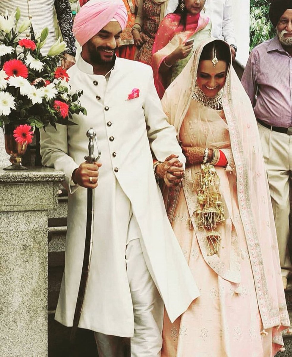 Surprise: Neha Dhupia gets married to Angad Bedi, see pics inside
