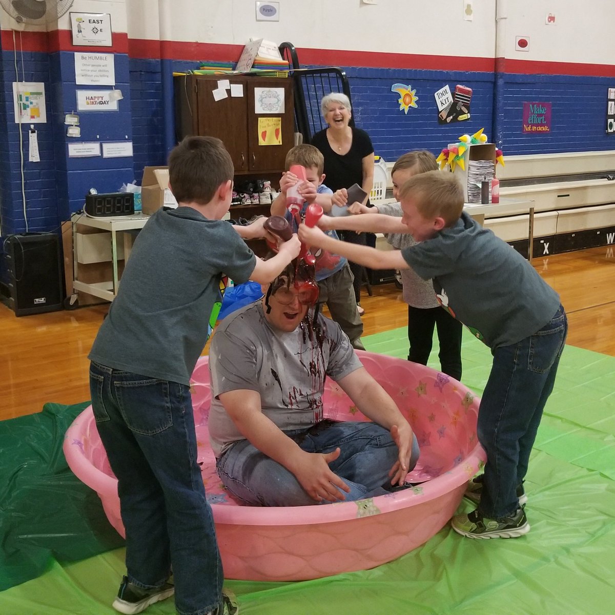 CHARGERSDE's tweet photo. Students at DE were challenged to bring in as many box tops as possible. The grade level that brought in the most got to turn Mr. A into a giant sundae. 1st Grade won the contest, but the real winner was DE because we raised over $1000. Great Job Kids! #WeRDC #DasselRocks https://t.co/DqMpqkdKLd
