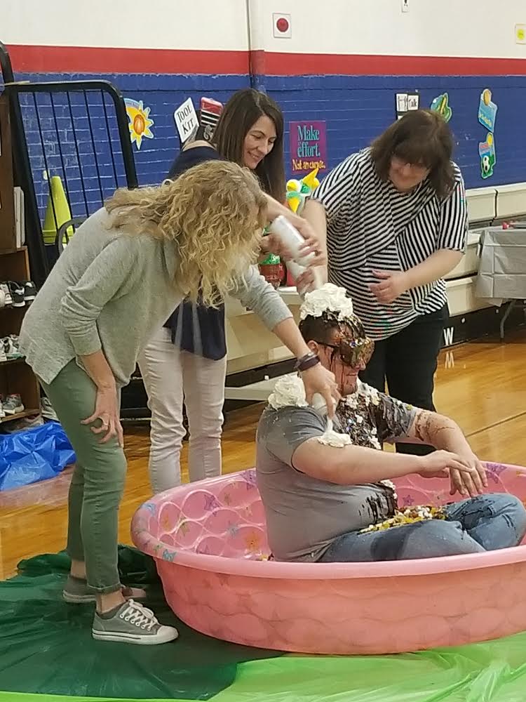 CHARGERSDE's tweet photo. Students at DE were challenged to bring in as many box tops as possible. The grade level that brought in the most got to turn Mr. A into a giant sundae. 1st Grade won the contest, but the real winner was DE because we raised over $1000. Great Job Kids! #WeRDC #DasselRocks https://t.co/DqMpqkdKLd