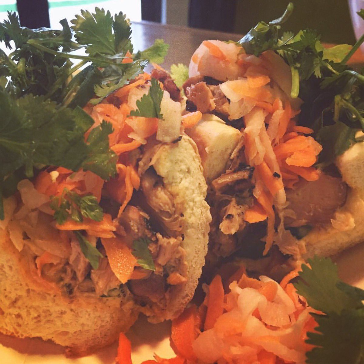 Marinated lemongrass chicken with sriracha mayo on a 10 inch bun-  meet our chicken Bánh mi 😋 📸 @laughendar #61pho #banhmi