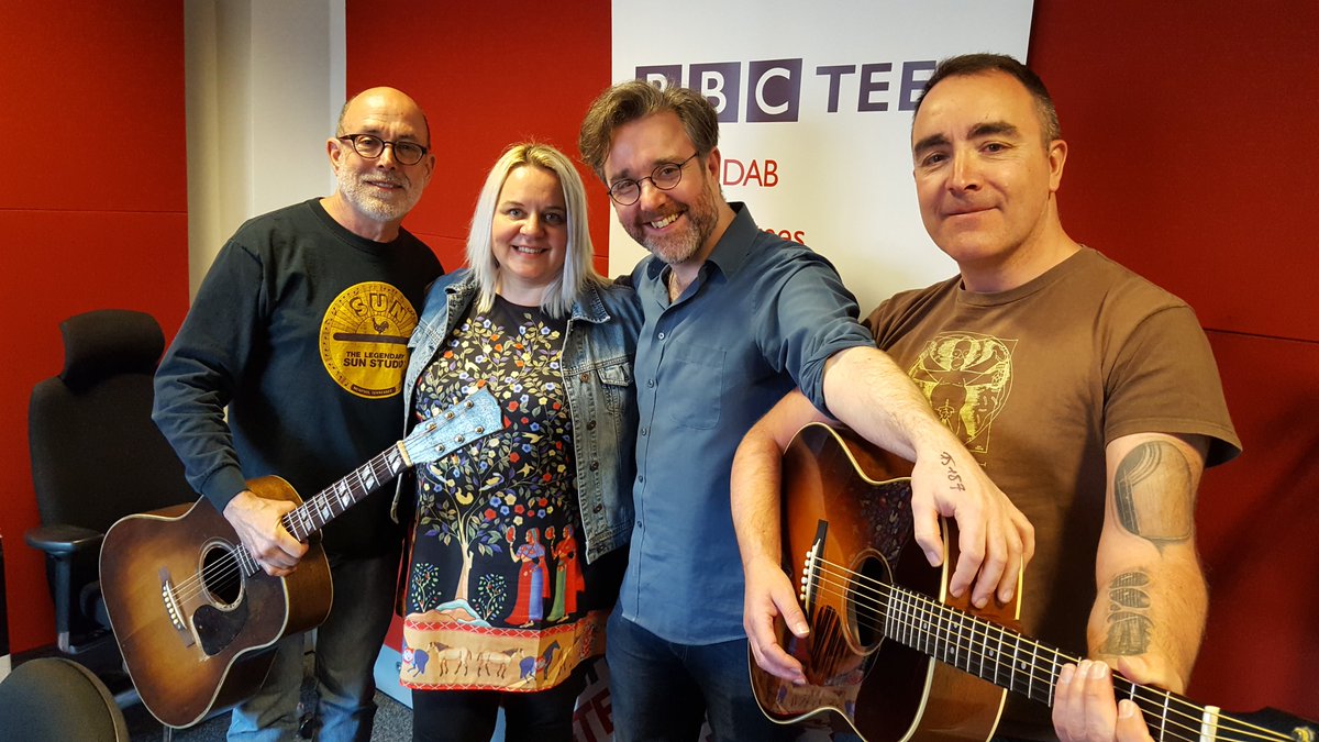 Bob_Fischer's tweet photo. Today's @BBCTees guests: 'Kalamazoo Gals' writer John Thomas, with @pegpowlerband's @saradennismusic and @MonkeyHanger303... see them all at @folklines tomorrow night. I have my hand on Eric Clapton's guitar. https://t.co/6dXh9fIM1q