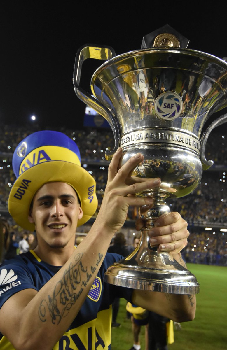 Argentina's tweet photo. [SELECCIONADOS] Cristian Pavón levanta la copa de la @argsaf tras su consagración con @BocaJrsOficial. https://t.co/Y7A1NiZYhG