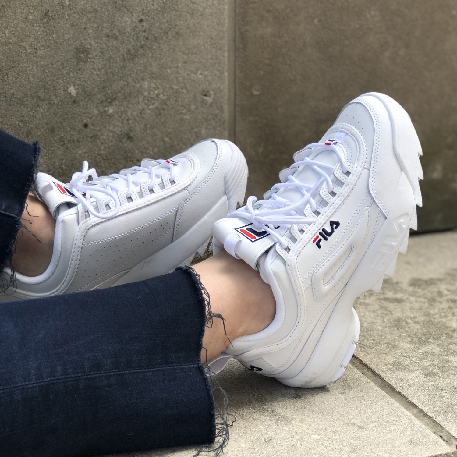 famous footwear fila disruptor